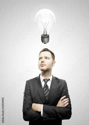 Photo: businessman and lamp businessman and lamp