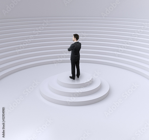 Photo: businessman standing on a podium businessman standing on a podium