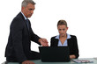 Boss sat with young employee