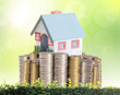 Photo: concept by money house from coins concept by money house from coins