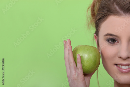 Photo: Woman with an apple Woman with an apple