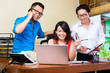 Photo: Asian Creative agency - team meeting in an office with laptop Asian Creative agency - team meeting in an office with laptop