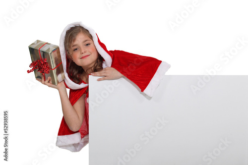 Photo: Little girl in festive outfit Little girl in festive outfit