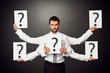 serious businessman with five hands