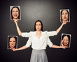 Photo: woman holding pictures with different mood woman holding pictures with different mood