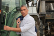 Photo: Man with tractor Man with tractor