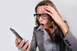 Businesswoman Reading Message ...