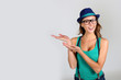 Stylish girl with green top showing message