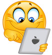 Vetor: Emoticon with tablet Emoticon with tablet