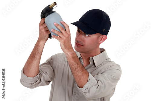 Photo: Man with a blowtorch Man with a blowtorch