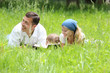 Young family reading the Bible