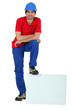 craftsman leaning his foot on a blank box