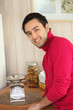 Photo: young man in a kitchen young man in a kitchen