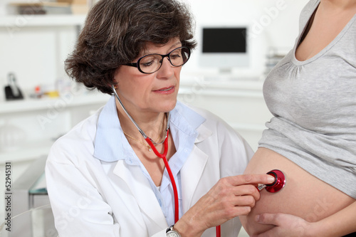 Photo: pregnant woman and obstetrician pregnant woman and obstetrician
