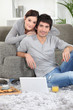 Photo: Portrait of a young couple at home Portrait of a young couple at home