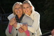 Photo: Grandmother and granddaughter hugging Grandmother and granddaughter hugging