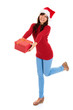Photo: Santa girl and Christmas gift Santa girl and Christmas gift