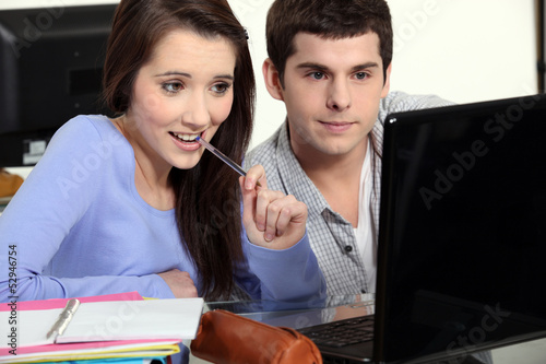 Photo: Students working at a laptop Students working at a laptop