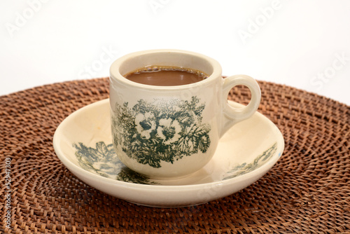 Photo: A Cup Of Freshly Brewed Coffee On A Table Mat A Cup Of Freshly Brewed Coffee On A Table Mat