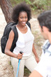 Mixed-race couple hiking