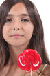 Photo: Girl licking a lollipop Girl licking a lollipop