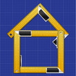 House Made of Iron Rulers with angle bar on Blueprint Background