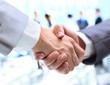 Photo: Closeup of a business handshake Closeup of a business handshake