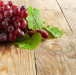Grapes on a wooden background