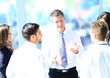 Business people working and discussing together