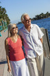 Happy Senior Couple Walking Tropical Sea or River