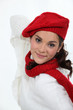Woman in a winter hat and scarf