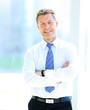 Smiling middle aged business man