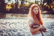 portrait of the rural red-haired girl