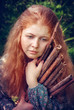 portrait of the rural red-haired girl