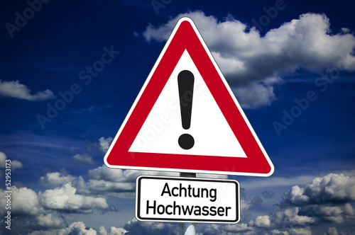 Photo: Schild mit Achtung Hochwasser Schild mit Achtung Hochwasser
