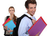 Photo: Jealous woman staring at a smiling man Jealous woman staring at a smiling man