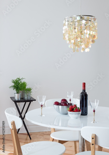 Photo: Dining room decorated with beautiful chandelier Dining room decorated with beautiful chandelier