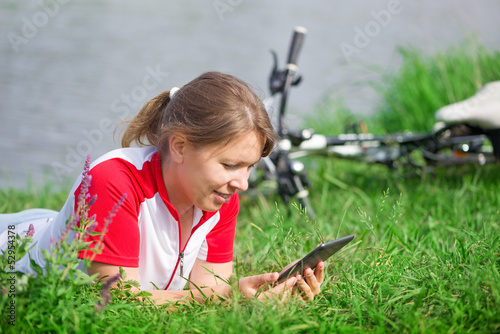 Photo: woman using tablet PC woman using tablet PC