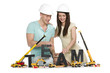 Photo: Forming a team: Cheerful man and woman building team-word. Forming a team: Cheerful man and woman building team-word.