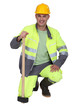 Photo: portrait of bricklayer all smiles with safety outfit portrait of bricklayer all smiles with safety outfit