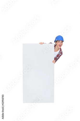 Photo: Chirpy female poster stood with blank panel Chirpy female poster stood with blank panel