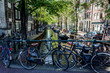 Amsterdam canal surrounded by bikes