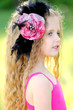 portrait of little girl outdoors in summer