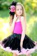 portrait of little girl outdoors in summer