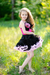 portrait of little girl outdoors in summer