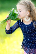 portrait of little girl outdoors in summer