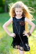 portrait of little girl outdoors in summer