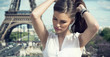 Fashion woman in romantic city