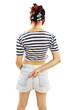 Young woman with fingers crossed behind back