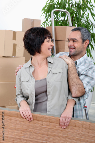 Photo: Mature couple moving house Mature couple moving house